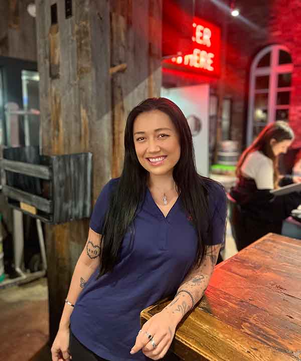 Portrait of Ashleigh Simmons, Bar Operations Director