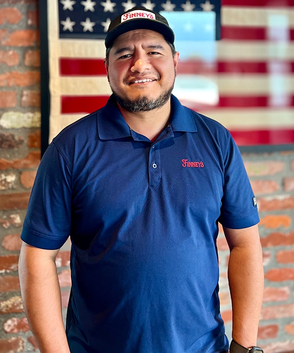Portrait of Oscar Guzman, Regional Kitchen Operations Manager